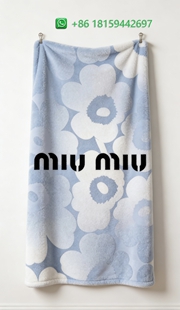 Miumiu Throw Blankets